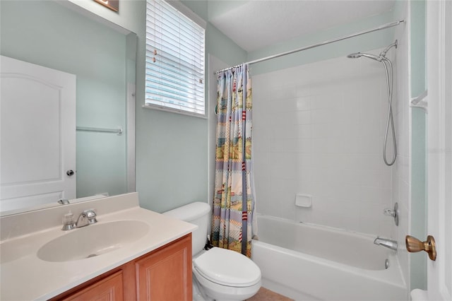 full bathroom featuring vanity, shower / bathtub combination with curtain, and toilet