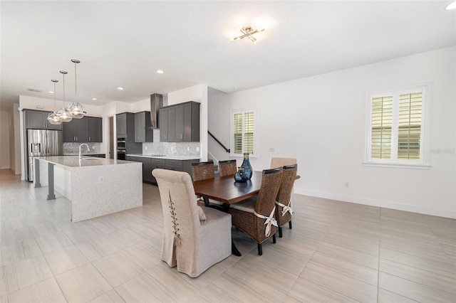 tiled dining space with sink