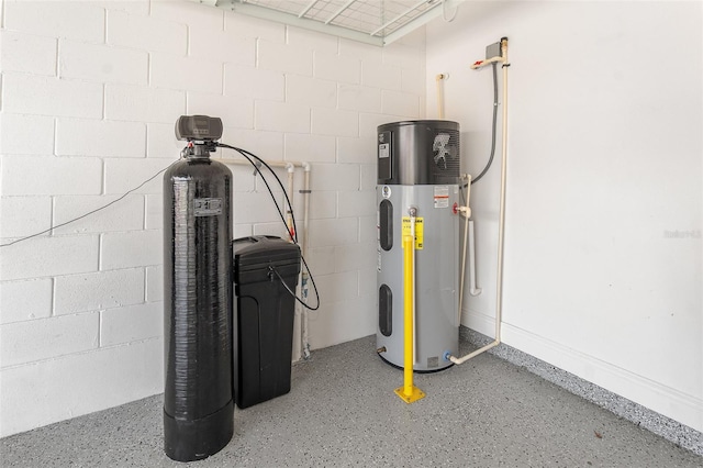 utility room featuring heat pump water heater