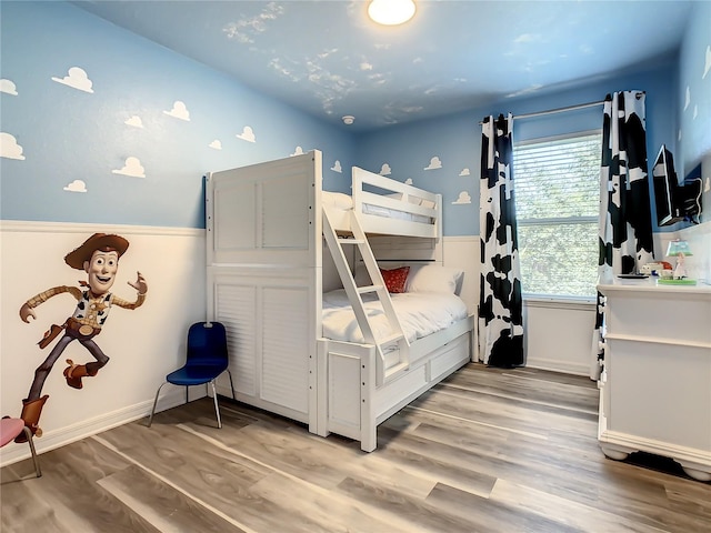 bedroom with light hardwood / wood-style flooring