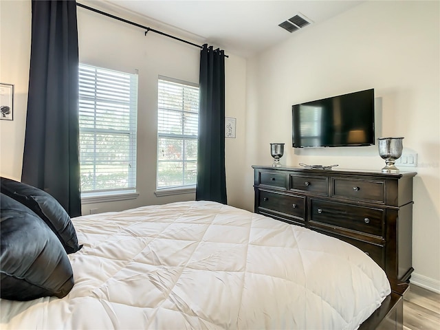 bedroom featuring light hardwood / wood-style floors