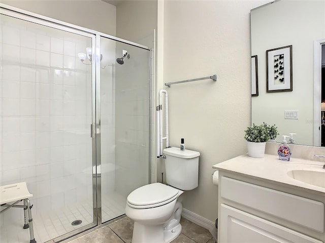 bathroom with walk in shower, vanity, toilet, and tile patterned flooring