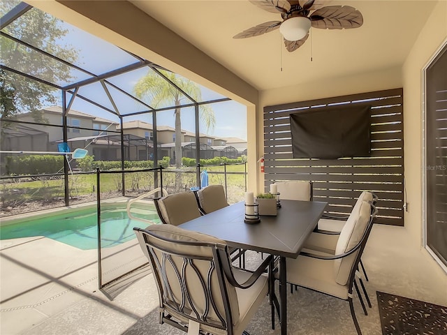 view of patio / terrace with a lanai and ceiling fan