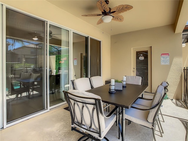 view of patio / terrace featuring ceiling fan