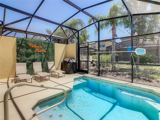 view of pool featuring a patio, a lanai, and a grill