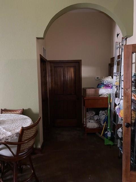 709 N Disston, Tavares, FL 32778 - bedroom featuring arched walkways