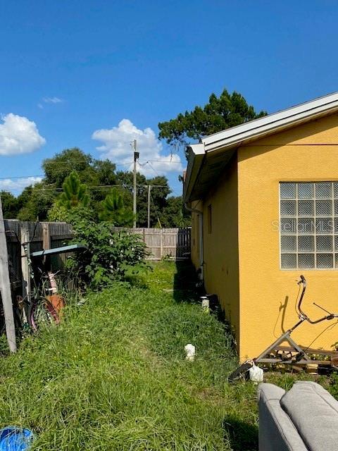 709 N Disston, Tavares, FL 32778 - view of yard featuring fence