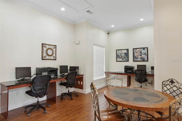 home office featuring hardwood / wood-style flooring and crown molding