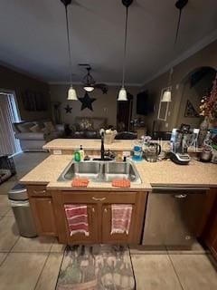 kitchen with pendant lighting, sink, a kitchen island with sink, light tile patterned floors, and ceiling fan