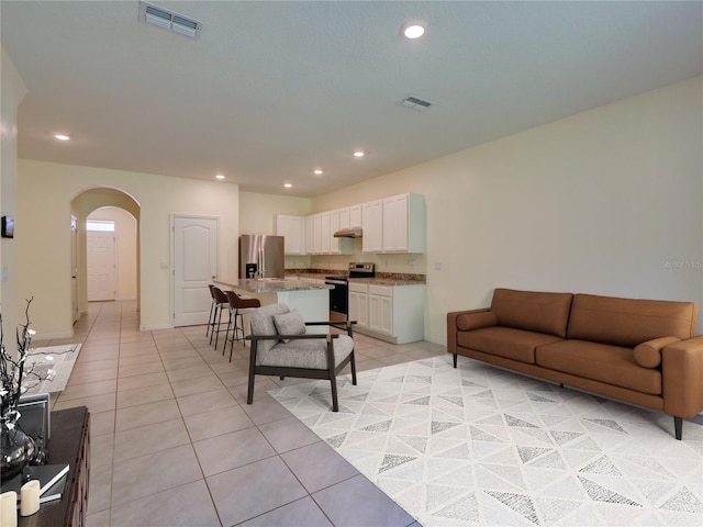 living room featuring light tile patterned flooring