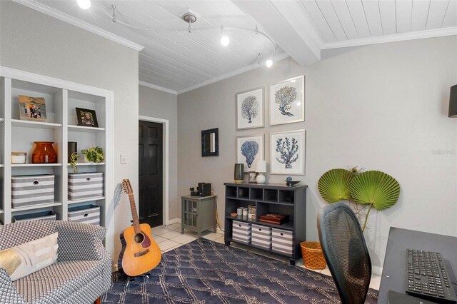 living area with beamed ceiling, crown molding, tile patterned floors, and track lighting