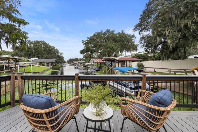 wooden deck featuring a boat dock