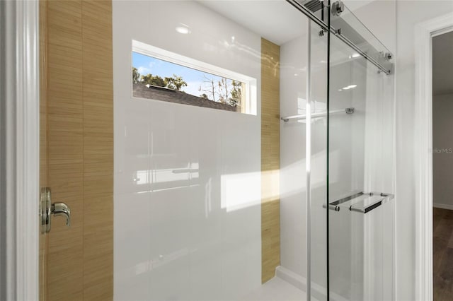 bathroom with an enclosed shower