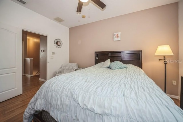 bedroom with wood-type flooring and ceiling fan