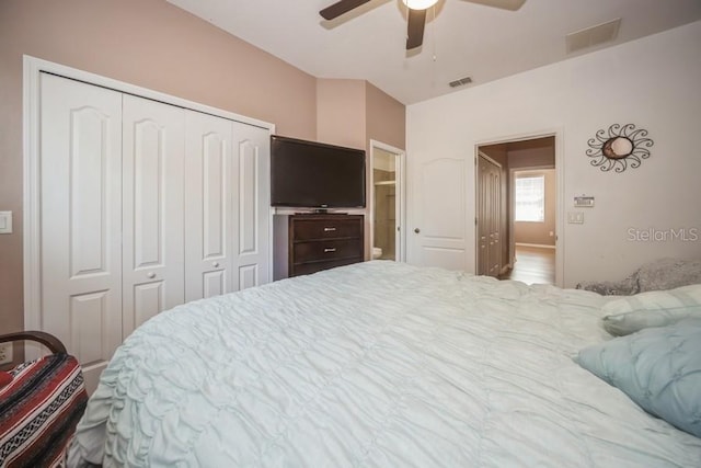 bedroom with ceiling fan and a closet