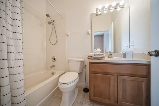 full bathroom featuring vanity, toilet, tile patterned flooring, and shower / bath combination with curtain