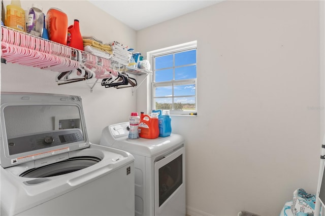 laundry room featuring independent washer and dryer