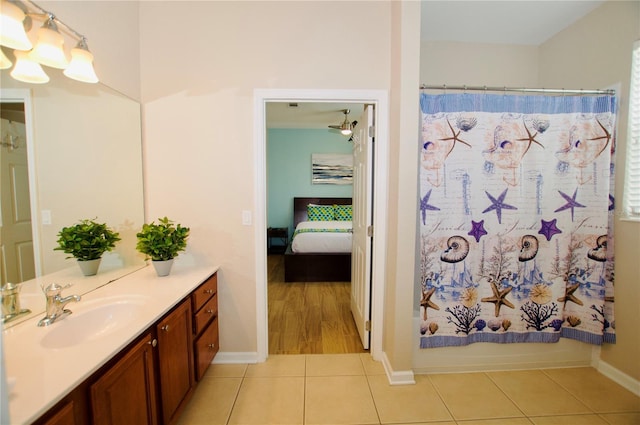 4114 Breakview Dr Unit 406, Orlando, FL 32819 - full bathroom with a shower with curtain, vanity, ensuite bath, and tile patterned floors
