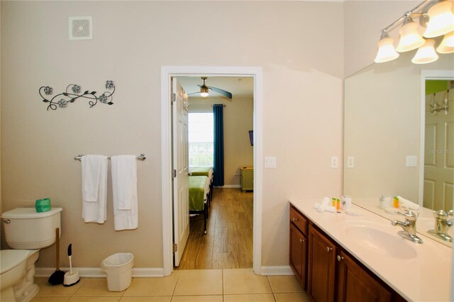 4114 Breakview Dr Unit 406, Orlando, FL 32819 - bathroom with visible vents, tile patterned flooring, vanity, and baseboards