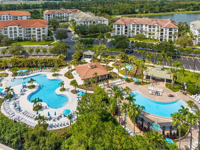 birds eye view of property featuring a water view