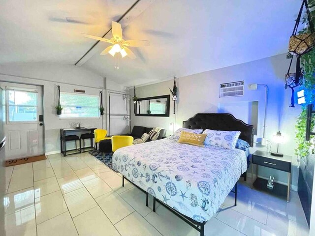 tiled bedroom with ceiling fan, lofted ceiling with beams, and an AC wall unit