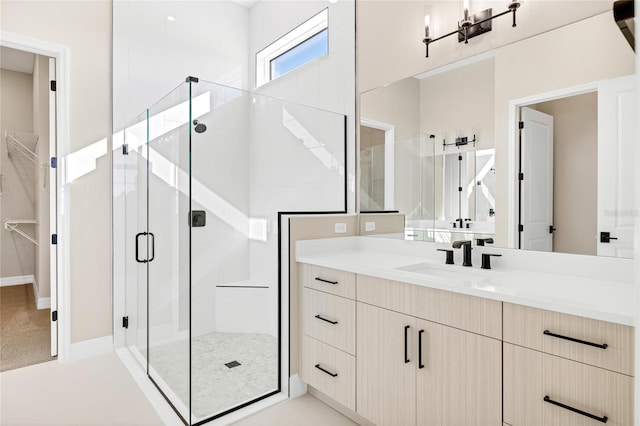 bathroom with vanity and walk in shower