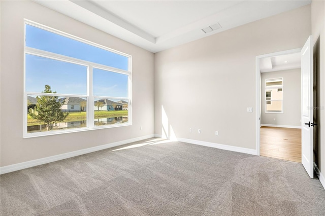 empty room featuring carpet flooring