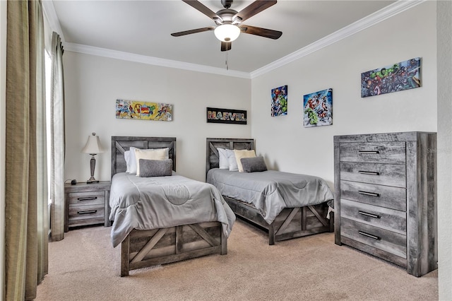 carpeted bedroom featuring ceiling fan and crown molding