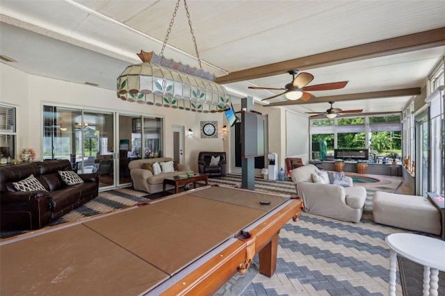 playroom featuring pool table, ceiling fan, and beamed ceiling