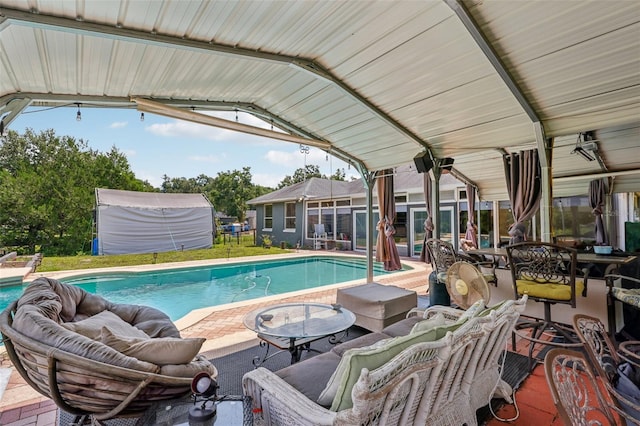 view of swimming pool with outdoor lounge area