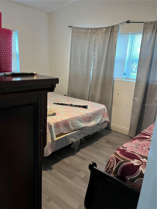 bedroom featuring light wood finished floors