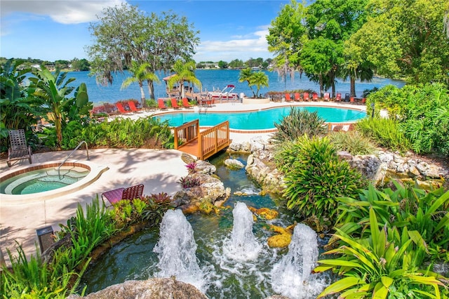 view of pool with a community hot tub