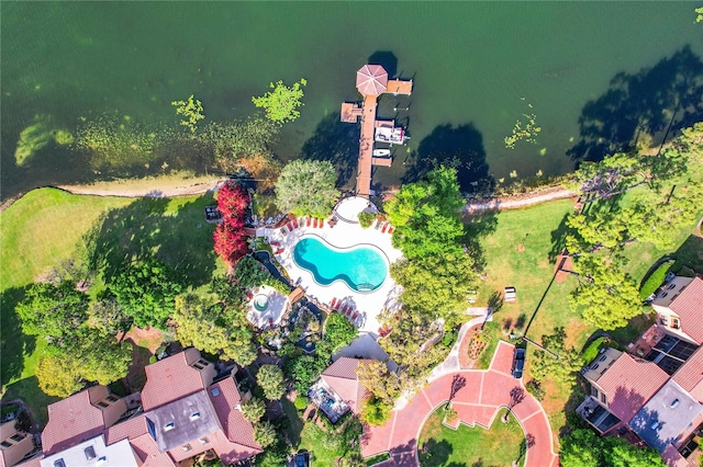 birds eye view of property with a water view