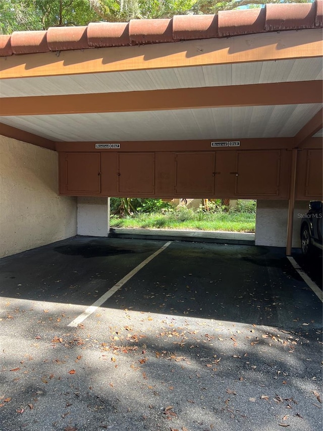 view of parking featuring a carport