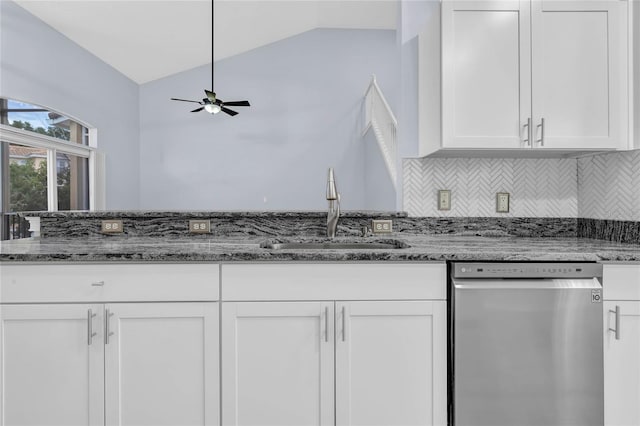 kitchen featuring stone counters, ceiling fan, lofted ceiling, white cabinetry, and dishwasher