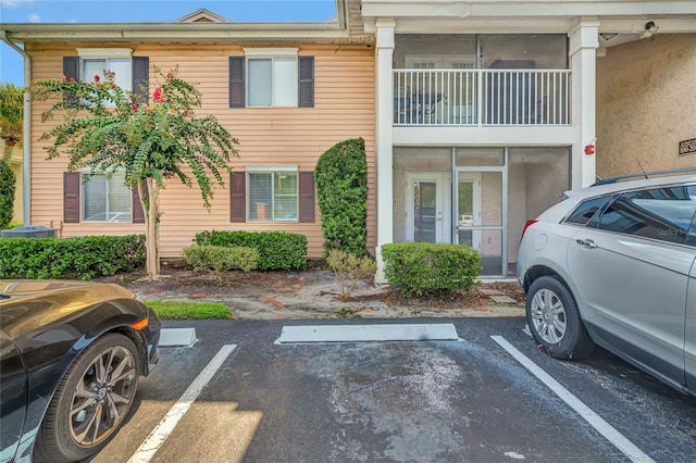 view of front of home featuring uncovered parking