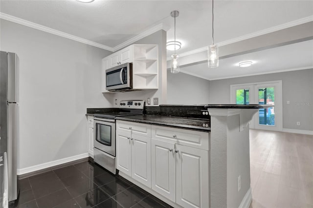 kitchen with dark countertops, a peninsula, stainless steel appliances, white cabinetry, and open shelves