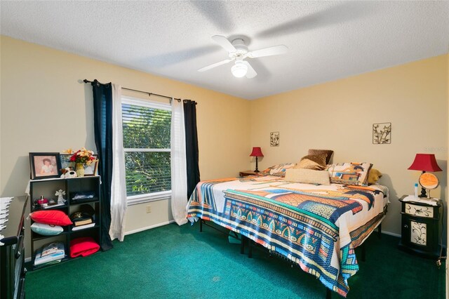 carpeted bedroom featuring a textured ceiling and ceiling fan