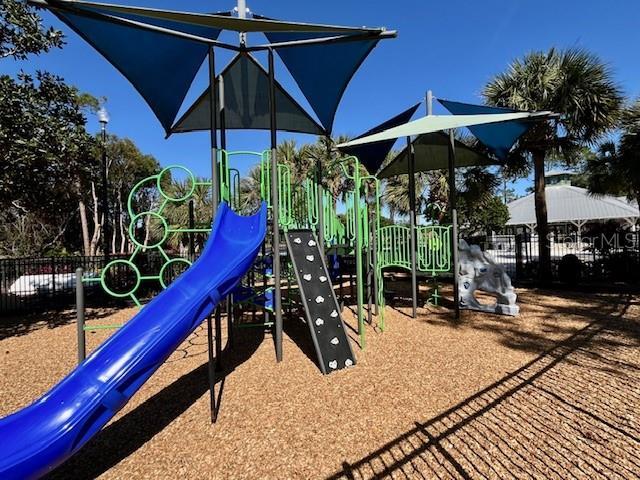 community play area featuring fence