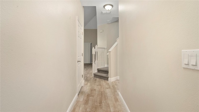 hallway with light wood-type flooring