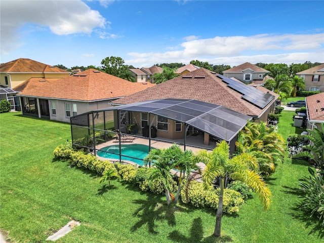 view of swimming pool with a yard