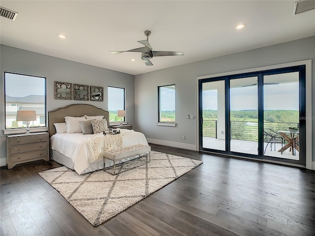 bedroom with ceiling fan, access to exterior, and dark hardwood / wood-style floors