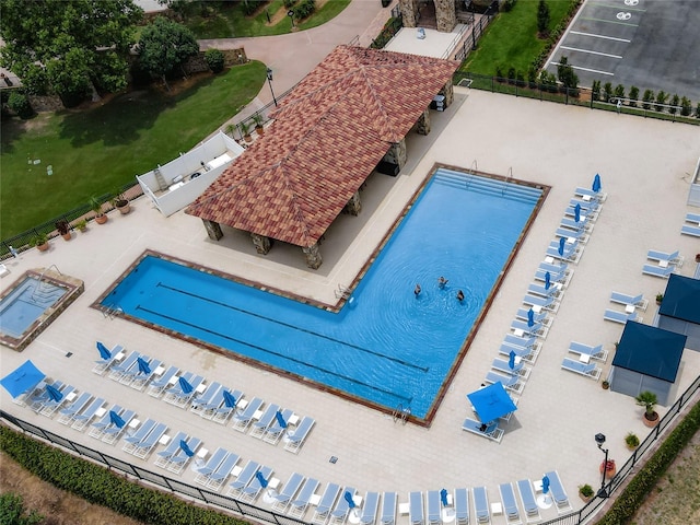 view of swimming pool featuring a patio area