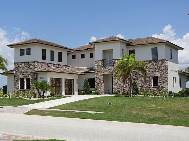 view of front facade with a front yard