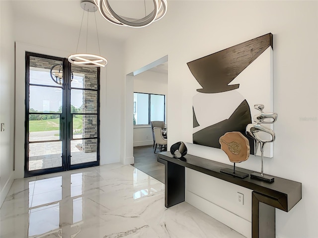 interior space featuring french doors and light tile patterned floors