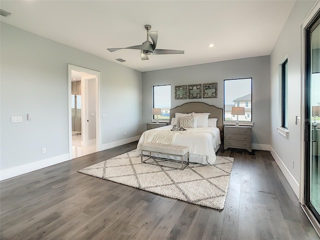 bedroom with ceiling fan and hardwood / wood-style floors