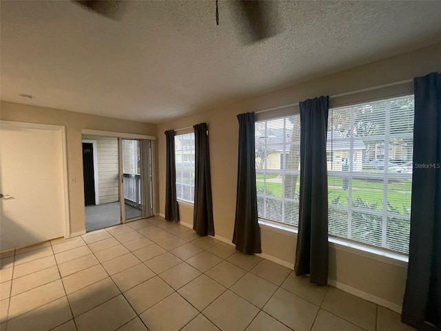 1073 S Hiawassee Rd Unit 1018, Orlando, FL 32835 - empty room with baseboards and a healthy amount of sunlight