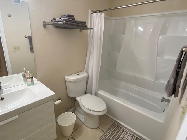 1073 S Hiawassee Rd Unit 1018, Orlando, FL 32835 - full bathroom with shower / tub combo with curtain, toilet, tile patterned flooring, and vanity