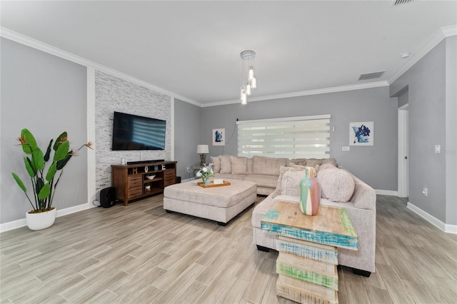 living room with crown molding and light hardwood / wood-style floors