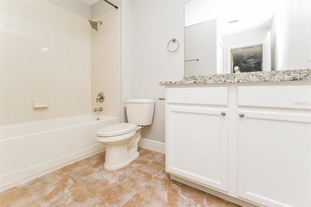 full bathroom with vanity, tiled shower / bath, tile patterned floors, and toilet